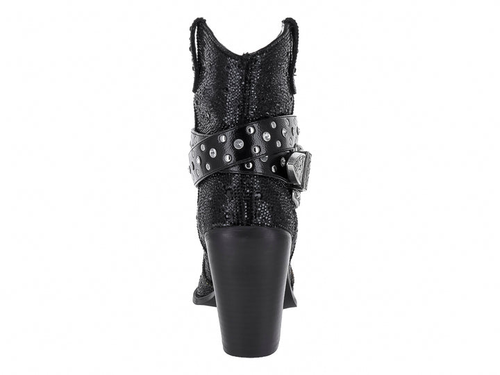 Botas negras de Steve Madden con tacón cuadrado, detalles de tachuelas y hebilla plateada ornamentada.