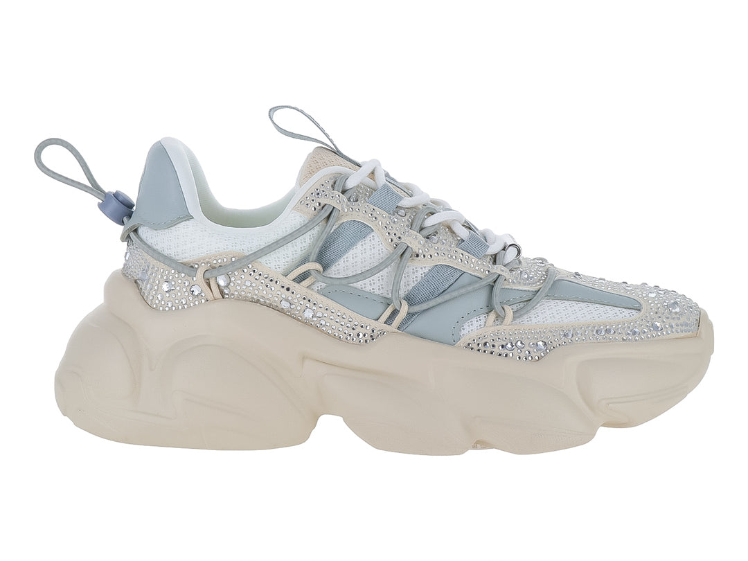 Tenis Steve Madden Specta Tor en color bone con suela chunky y detalles de cristales brillantes.