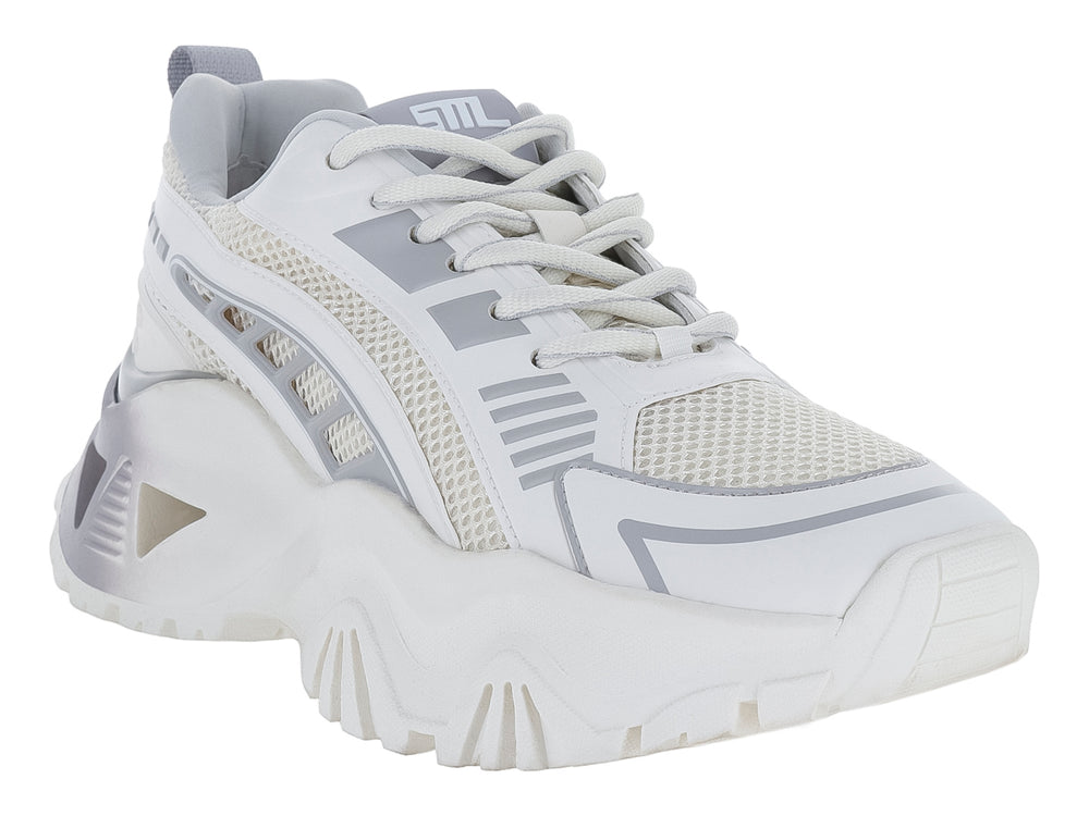 Tenis Steve Madden Fenixx en colores blanco y gris con suela gruesa y dentada.