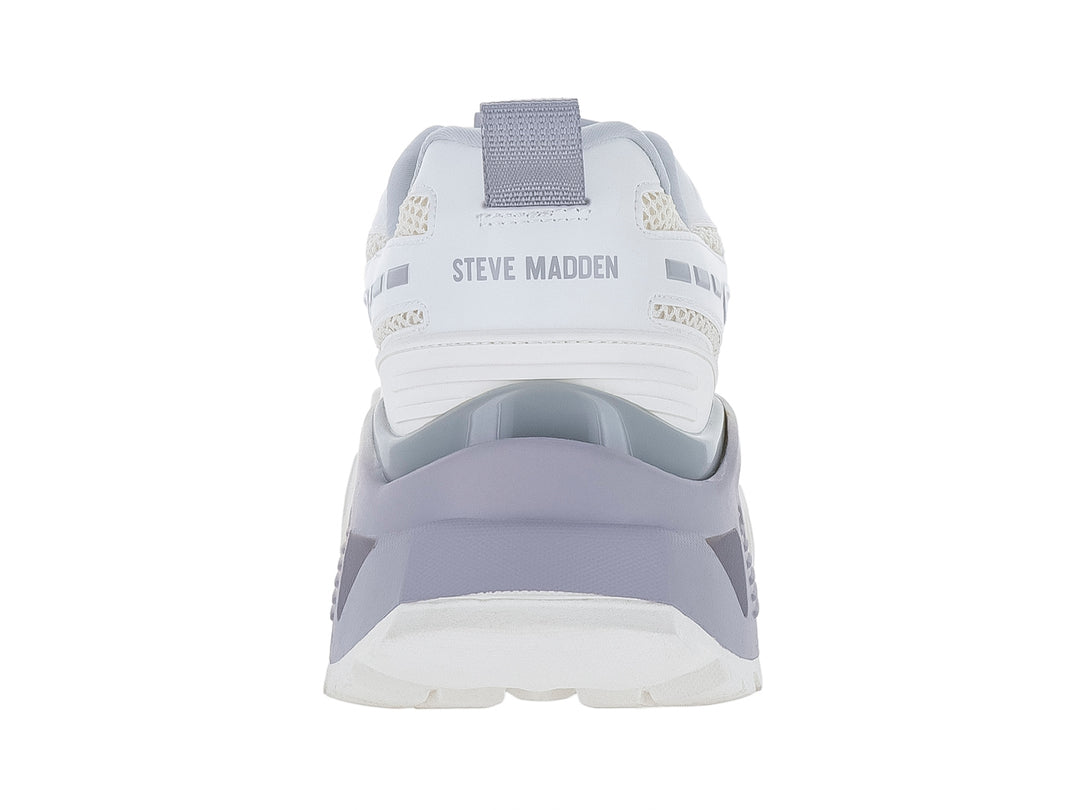 Tenis Steve Madden Fenixx en colores blanco y gris con suela gruesa y dentada.