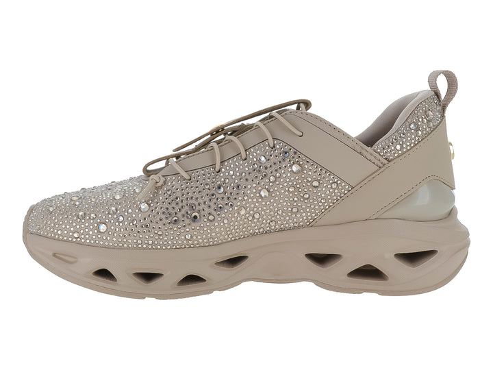 Tenis Steve Madden color rose gold con detalles de cristales brillantes y suela gruesa esculpida.