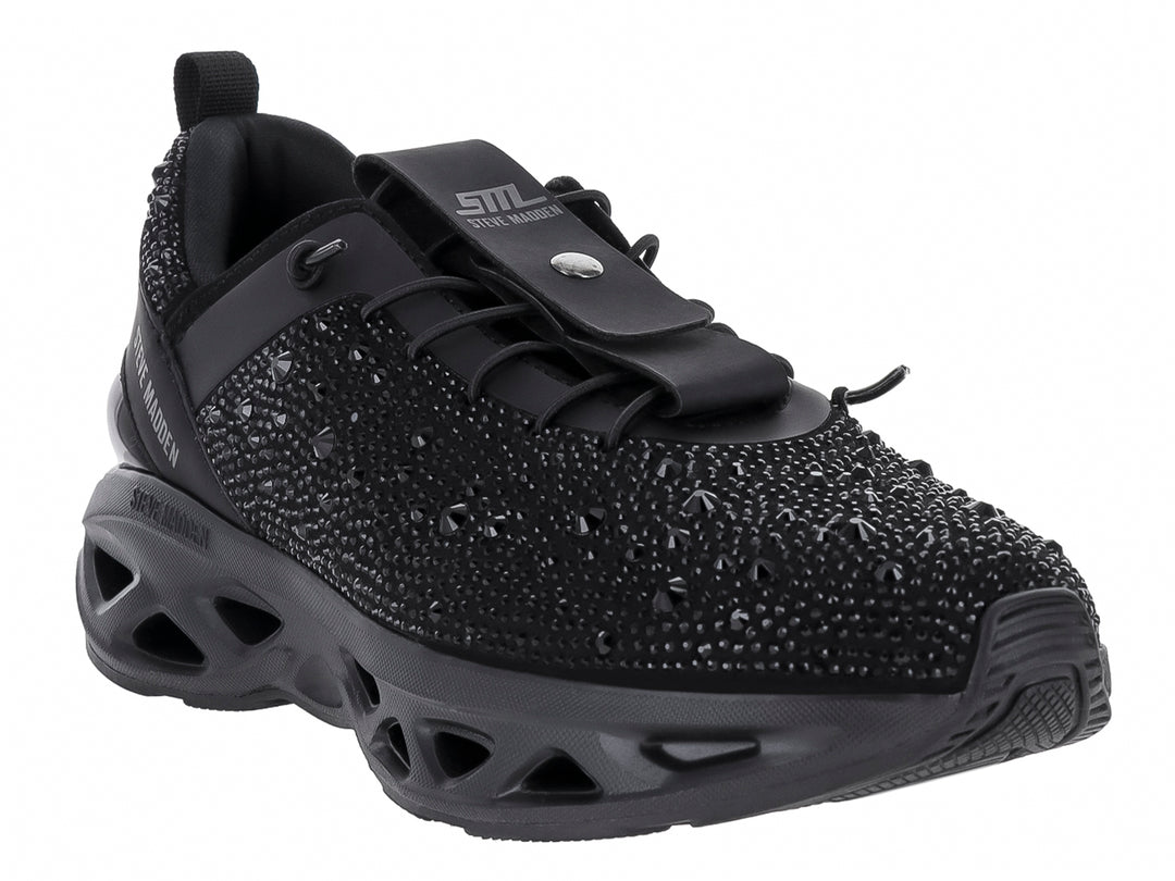 Tenis negros Steve Madden con incrustaciones brillantes y suela chunky.