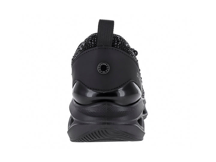 Tenis negros Steve Madden con incrustaciones brillantes y suela chunky.