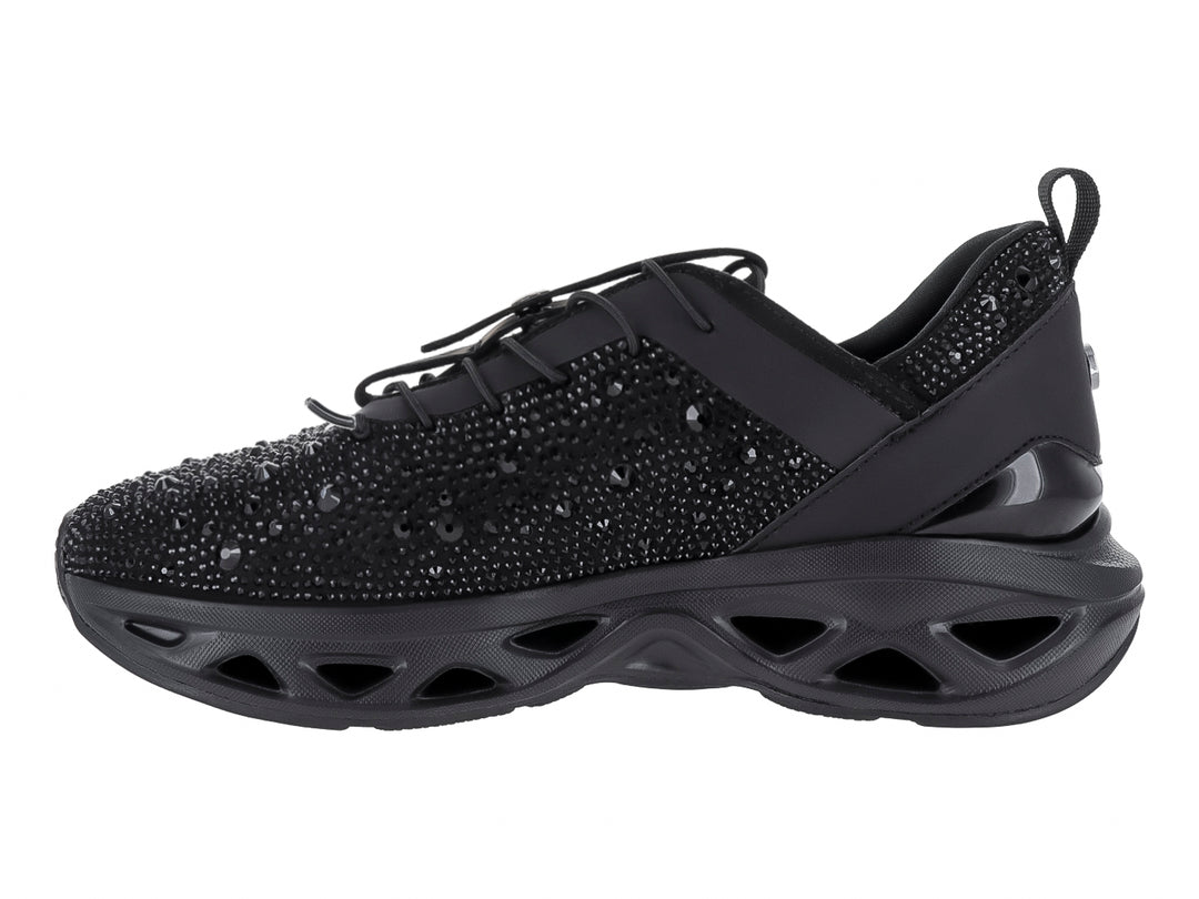 Tenis negros Steve Madden con incrustaciones brillantes y suela chunky.