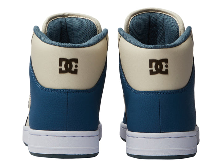 Tenis DC Shoes de bota alta en colores azul y beige con suela blanca.