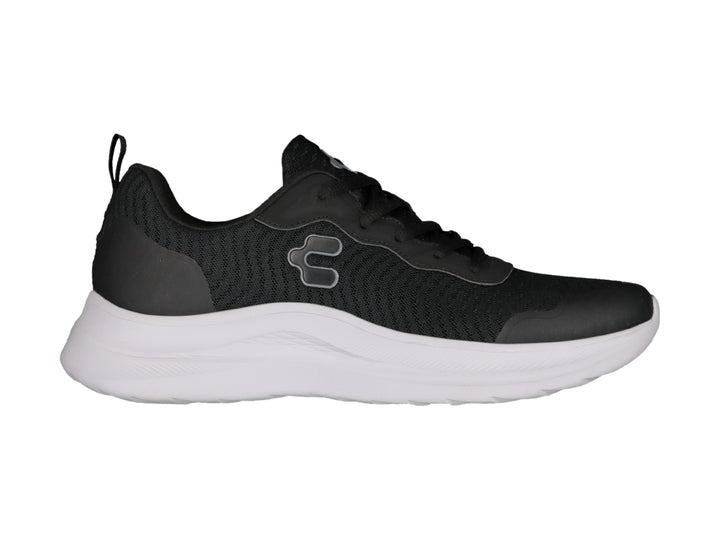 Tenis deportivos Charly color negro con suela blanca y tejido de malla.