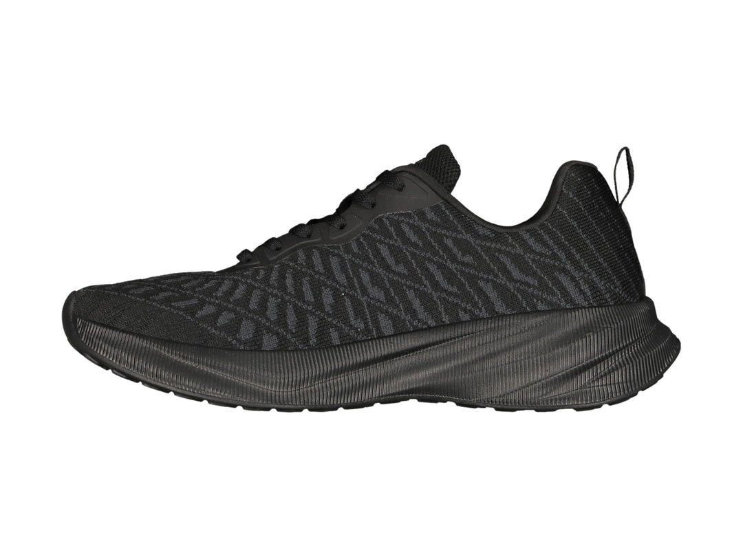 Tenis deportivos Charly color negro con tejido de malla y suela texturizada.