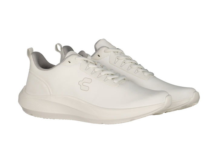 Tenis deportivos Charly de color blanco con suela blanca y cordones.