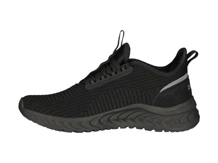 Tenis deportivos Charly color negro con suela gruesa y detalle gris en el talón.