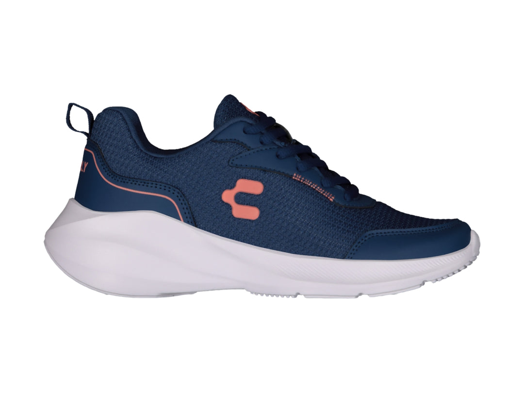 Tenis deportivos Charly color azul marino con suela blanca y detalles en coral.