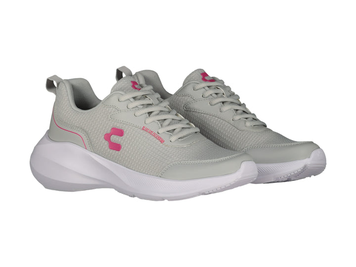 Tenis deportivos Charly en color gris con suela blanca y detalles en rosa.