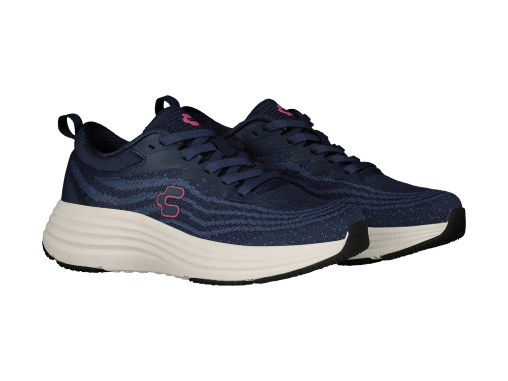 Tenis deportivos Charly color azul marino con suela blanca y detalle en rosa.