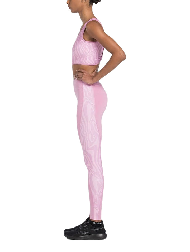 Leggings deportivos Reebok en color rosa ajustados al cuerpo con cintura alta.