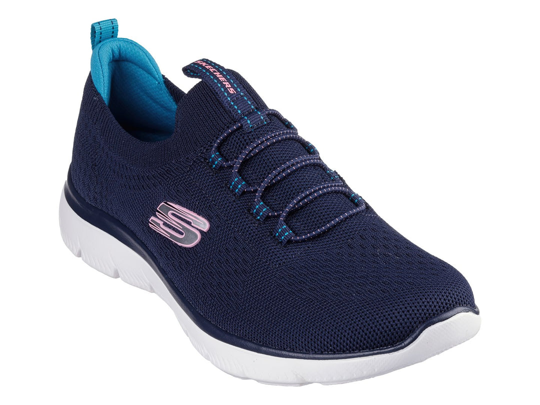 Tenis Skechers color azul marino con suela blanca y detalles en turquesa para deporte o uso casual.