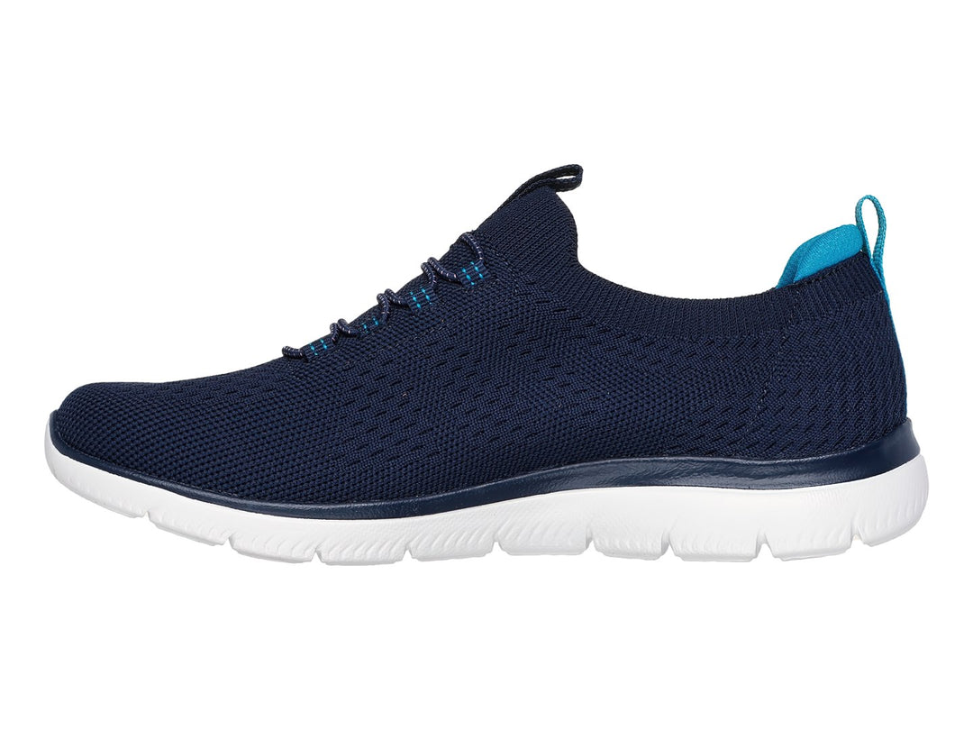 Tenis Skechers color azul marino con suela blanca y detalles en turquesa para deporte o uso casual.