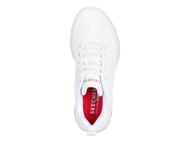 Tenis deportivos Skechers color blanco con amortiguación de aire visible en el talón.