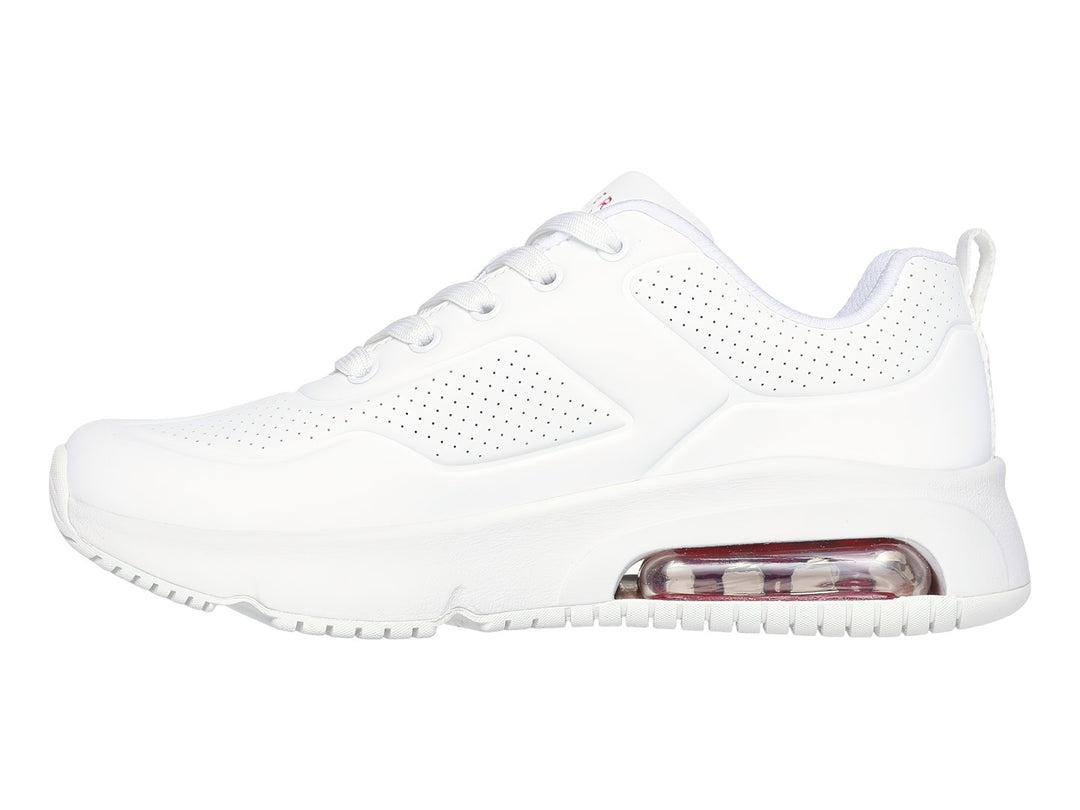 Tenis deportivos Skechers color blanco con amortiguación de aire visible en el talón.