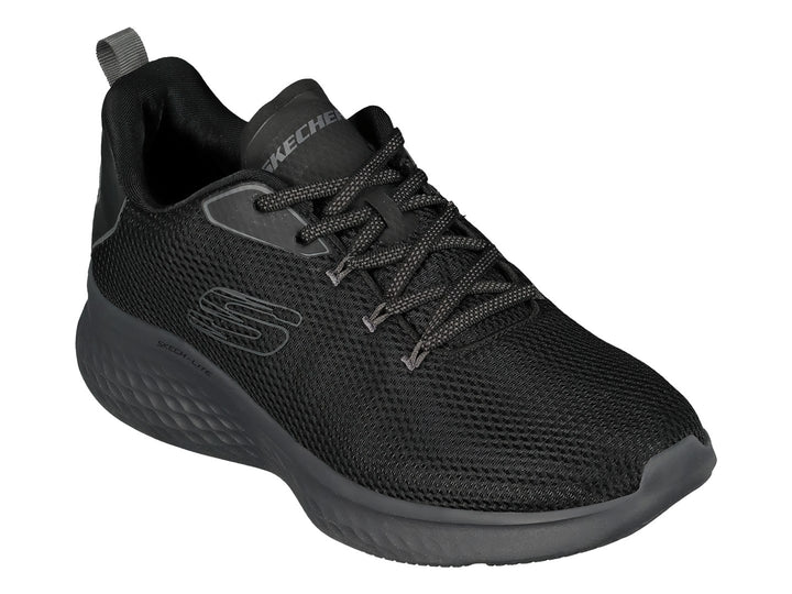 Tenis deportivos Skechers color negro con detalles en gris, diseño de malla transpirable y suela acolchada.