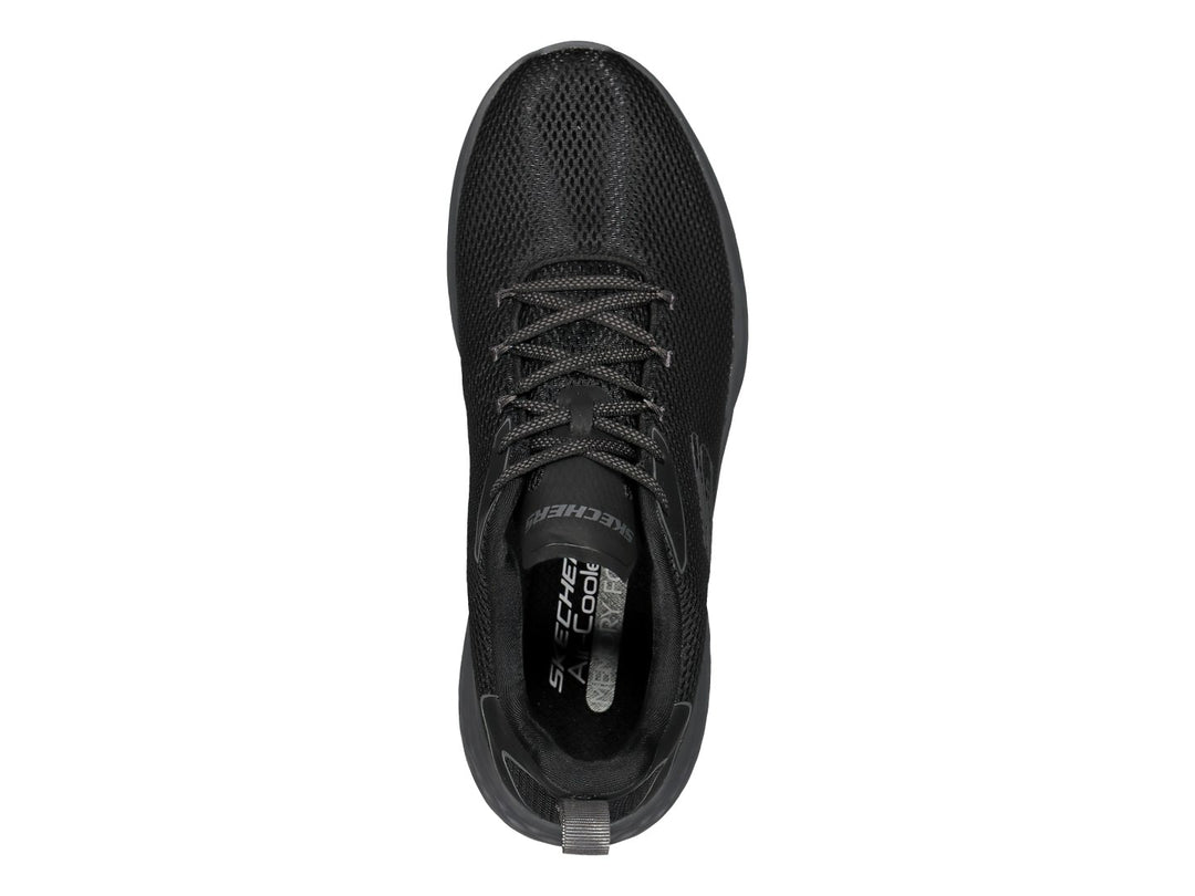 Tenis deportivos Skechers color negro con detalles en gris, diseño de malla transpirable y suela acolchada.