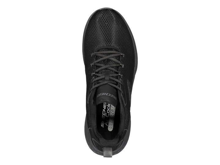 Tenis deportivos Skechers color negro con detalles en gris, diseño de malla transpirable y suela acolchada.