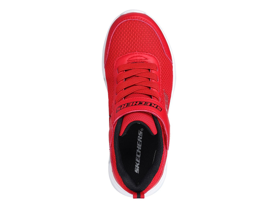 Tenis deportivos Skechers color rojo con suela blanca y cierre de velcro.
