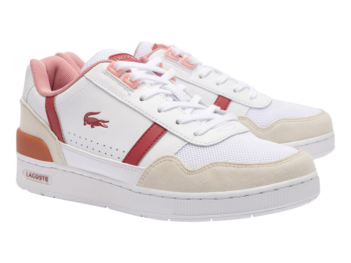 Tenis Lacoste T-Clip blancos con detalles en rosa, beige y naranja.