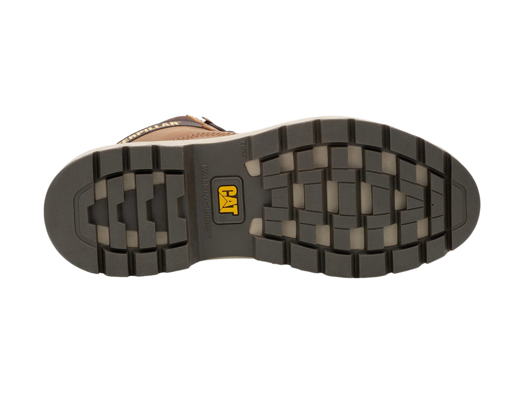 Zapato botín Caterpillar de cuero color tan con suela gruesa y detalles amarillos.