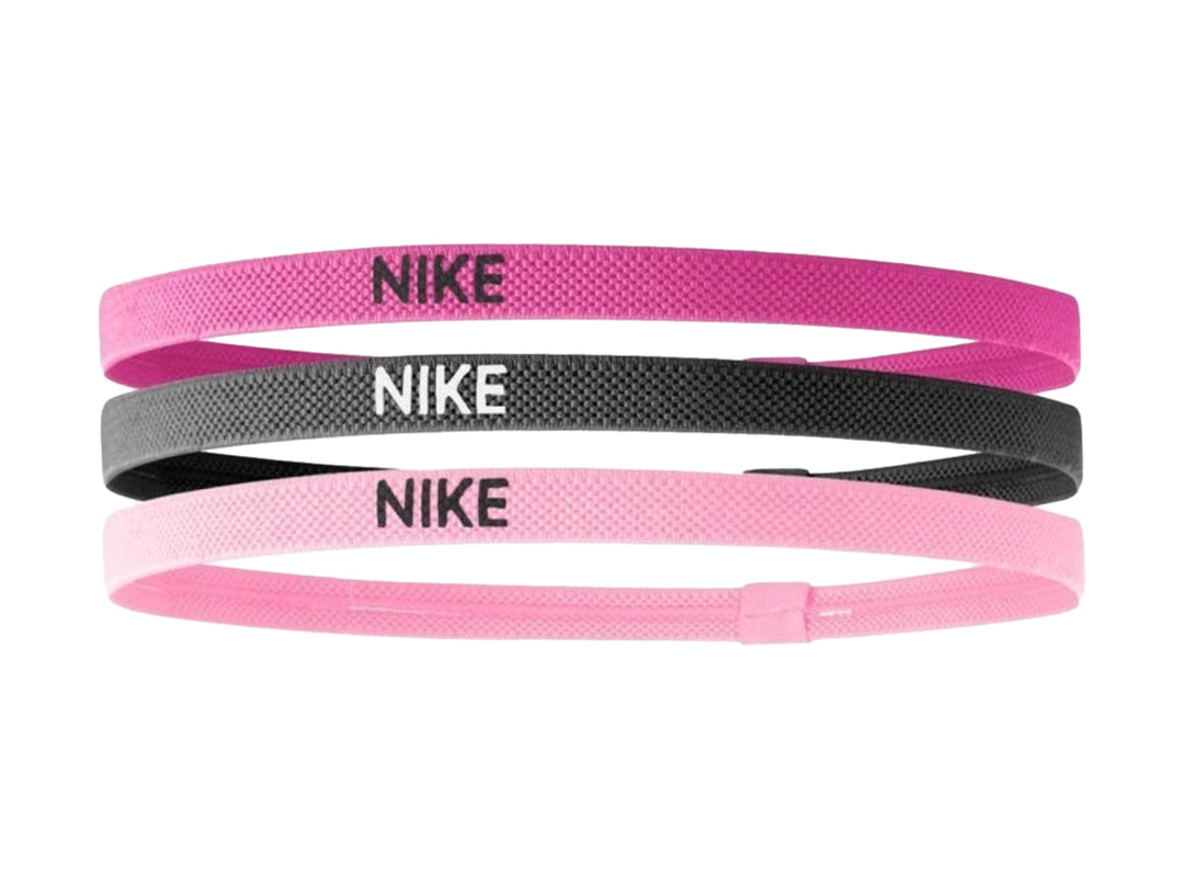 Set de tres bandas para la cabeza Nike en colores rosa fuerte, negro y rosa claro.