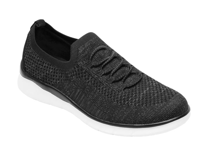 Tenis Flexi modelo Ashley en color negro con suela blanca y acabado textil tejido.