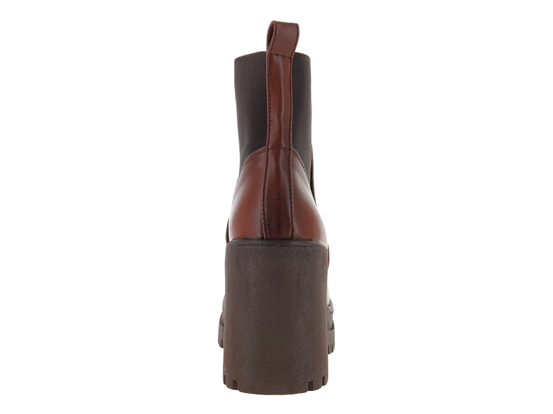 Botín Luna Rosa color tan con tacón grueso y suela dentada en marrón oscuro.