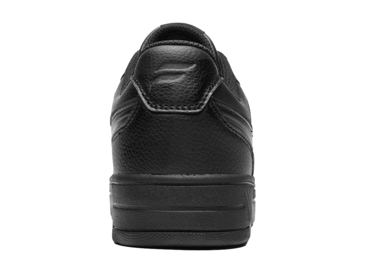 Tenis Flexi color negro totalmente monocromáticos con suela ancha y acabado en material sintético.