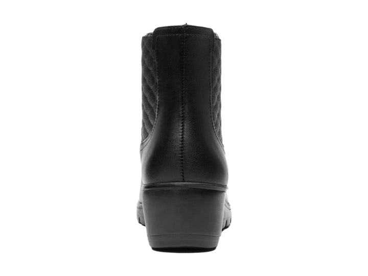 Botín Flexi para mujer en color negro, confeccionado en cuero con detalle acolchado lateral y suela cómoda.
