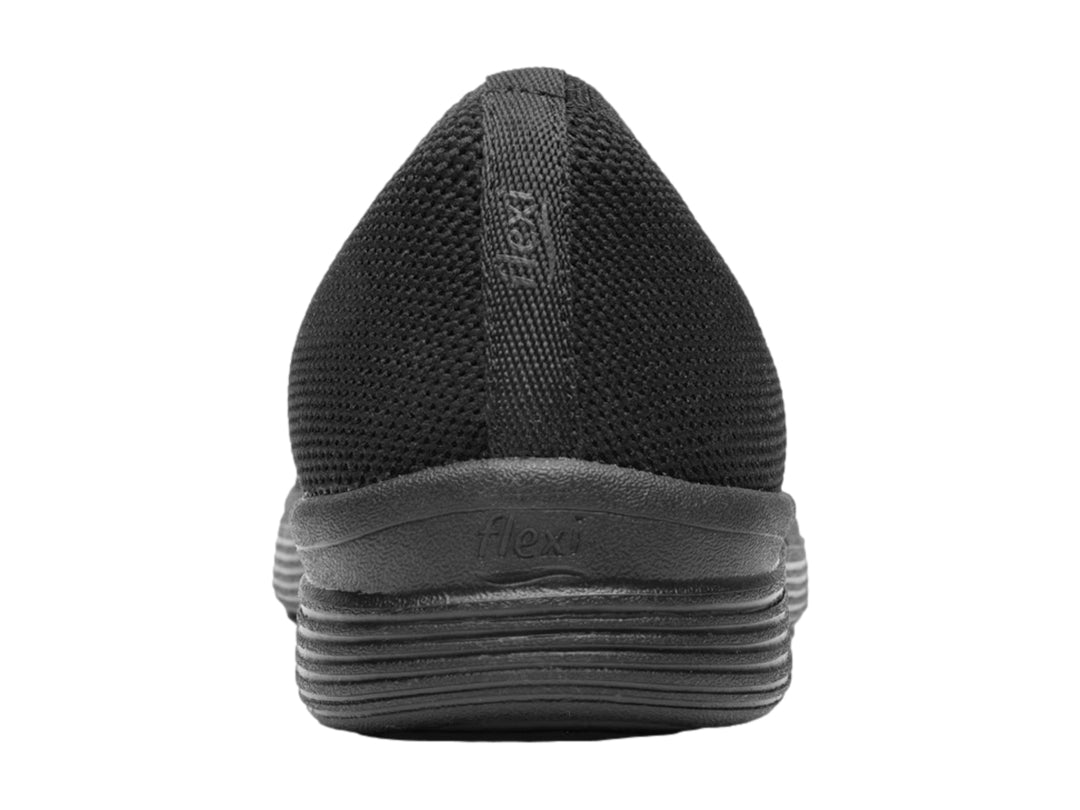 Zapato plano Flexi modelo Grecya en color negro, confeccionado en textil tejido con suela cómoda.