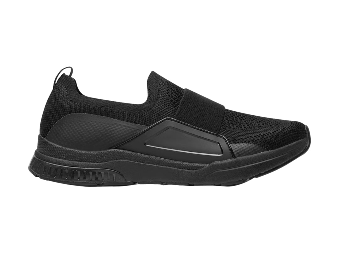Zapato plano Flexi color negro, estilo slip-on con tejido textil y suela cómoda.