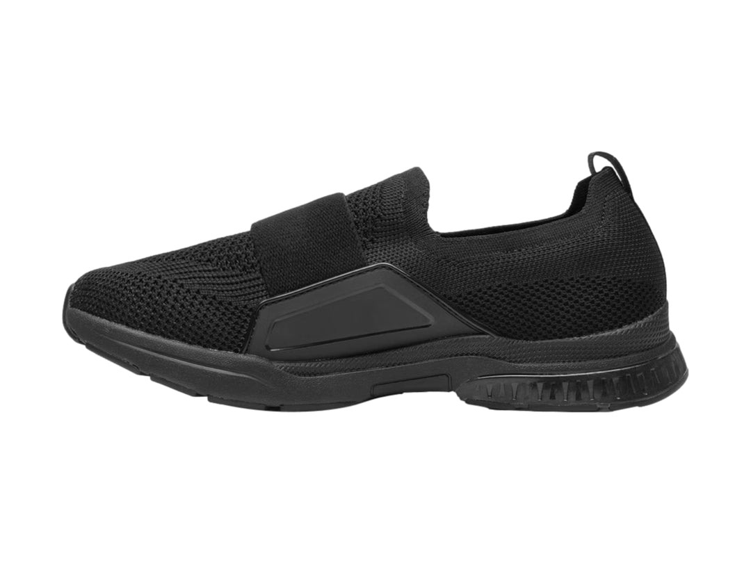 Zapato plano Flexi color negro, estilo slip-on con tejido textil y suela cómoda.