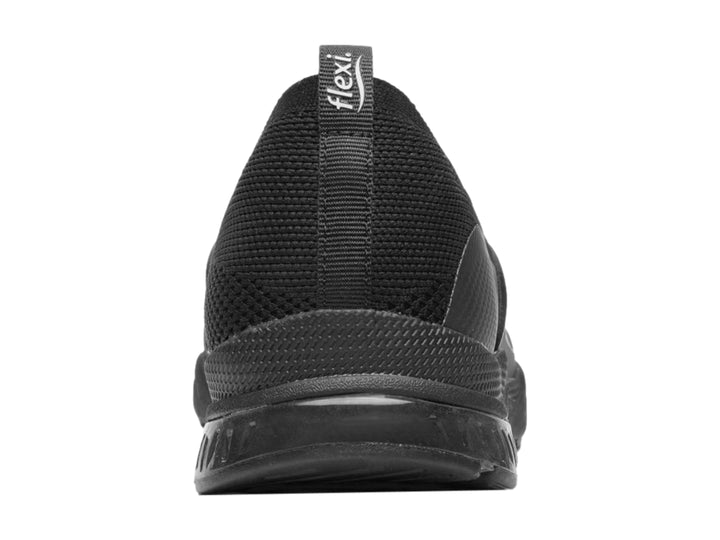 Zapato plano Flexi color negro, estilo slip-on con tejido textil y suela cómoda.