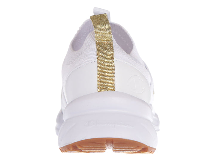 Tenis deportivos Champion color blanco con detalles dorados, diseño slip-on sin cordones y suela blanca.