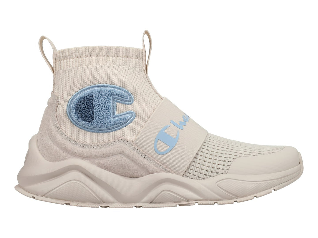 Tenis Champion color beige con detalles en azul cielo, diseño slip-on y suela gruesa.