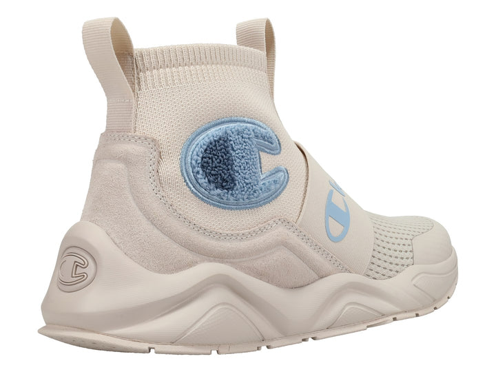 Tenis Champion color beige con detalles en azul cielo, diseño slip-on y suela gruesa.