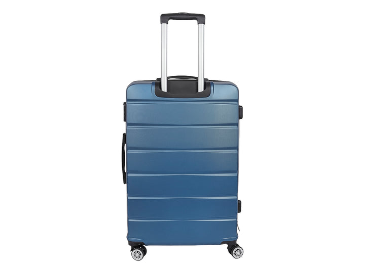Maleta rígida de color azul con ruedas y relieves horizontales en su superficie.