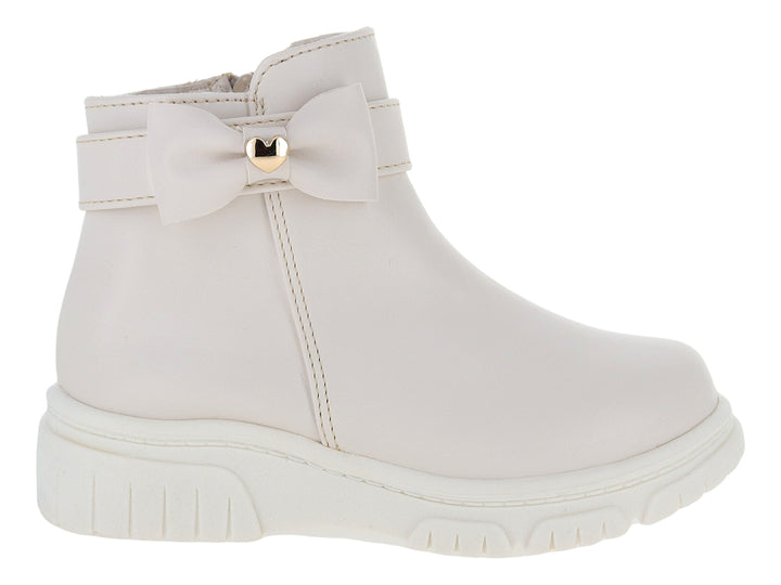 Botas color latte para niña con detalle de moño y corazón dorado en el tobillo y suela blanca gruesa.