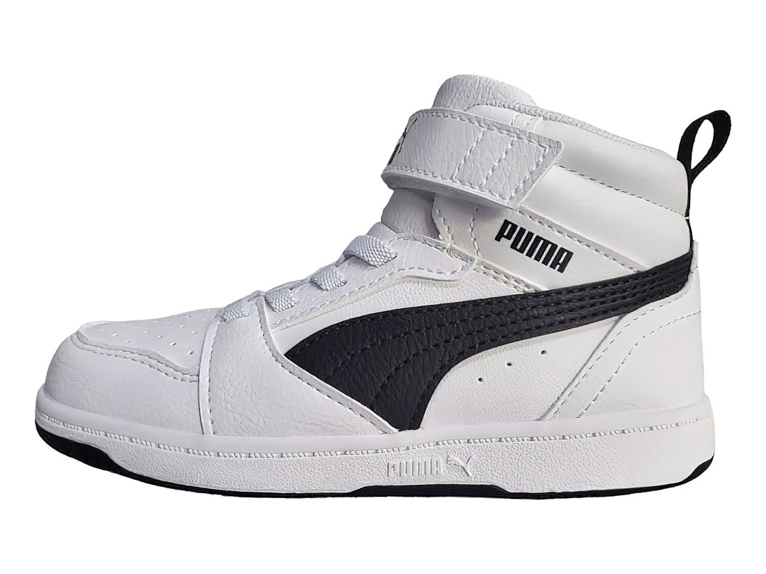 Tenis PUMA Rebound V6 Mid AC+ INF en color blanco con franja negra lateral y cierre de velcro.