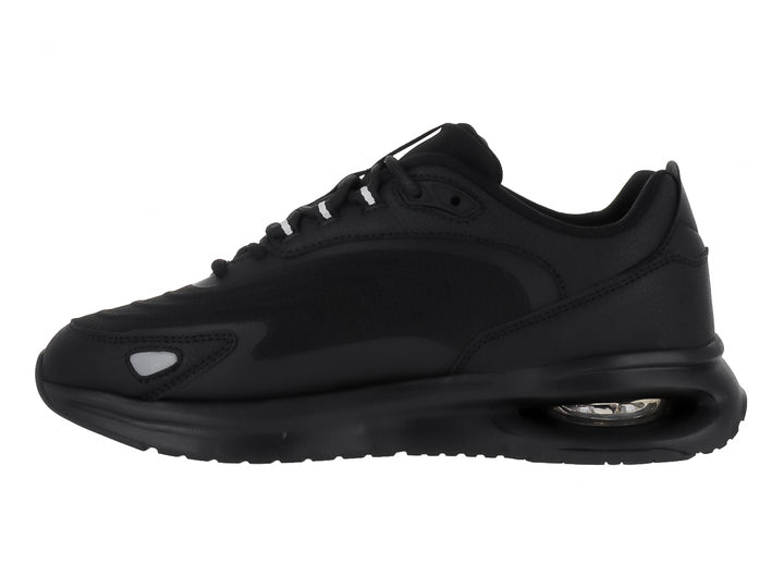 Tenis deportivos Lotto color negro monocromo con suela amortiguada y detalles en gris.