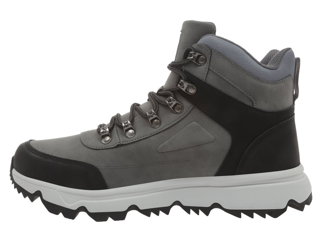 Bota K-Swiss color gris y negro con suela blanca y cordones.