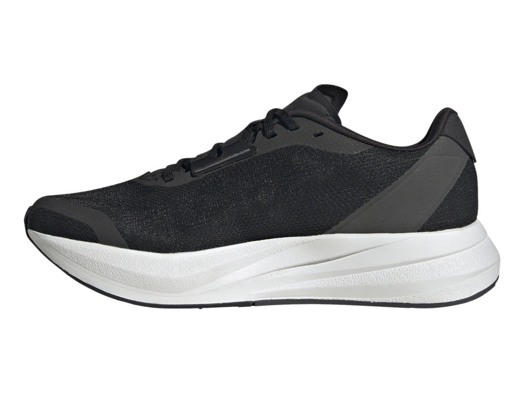 Tenis deportivos Adidas Duramo Speed en color negro con suela blanca y franjas plateadas laterales.