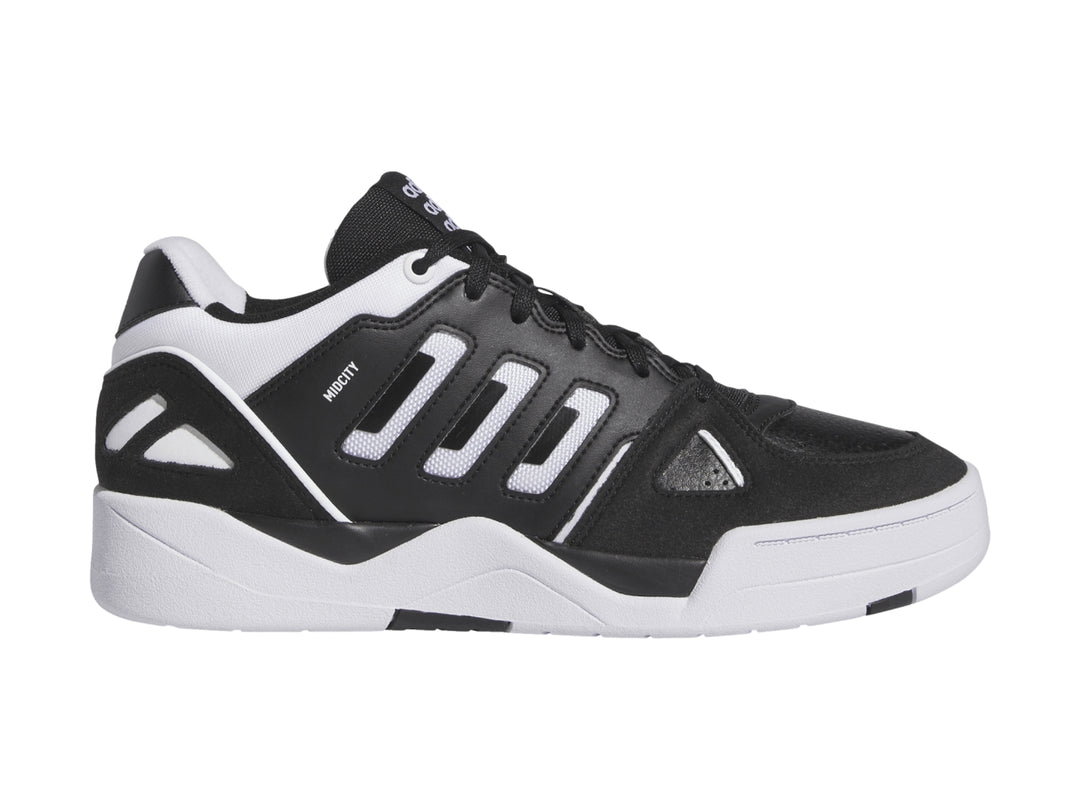 Tenis Adidas Midcity Low en color negro con detalles y suela blanca.