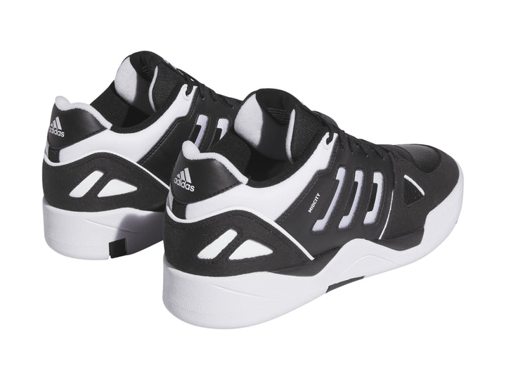 Tenis Adidas Midcity Low en color negro con detalles y suela blanca.