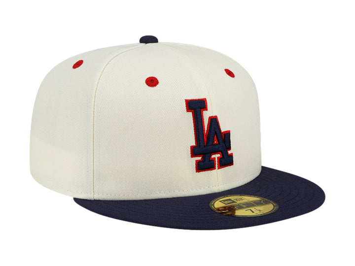 Gorra New Era blanca con visera azul marino y logo bordado de los Dodgers de Los Ángeles en el frente.