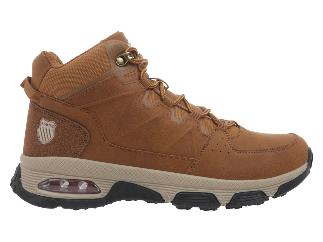 Bota K-SWISS color camel con suela negra y beige, diseño casual de caña media con amortiguación en el talón.