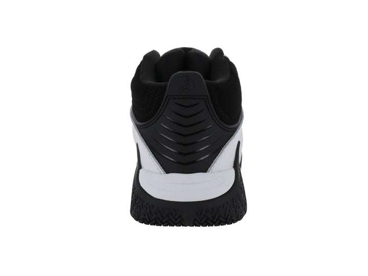 Tenis de baloncesto SHAQ de bota alta en colores negro y blanco con suela robusta.